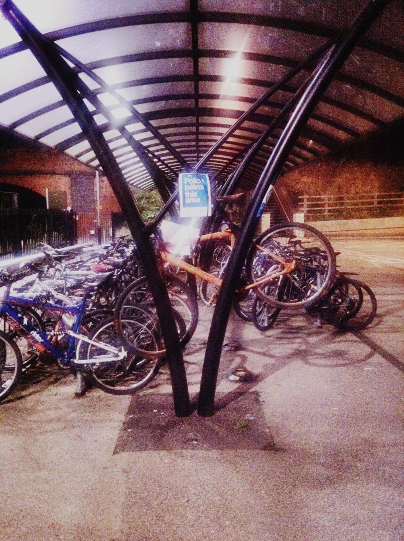 Photograph of bikes in Loughborough Railway Station at night by Paul Conneally