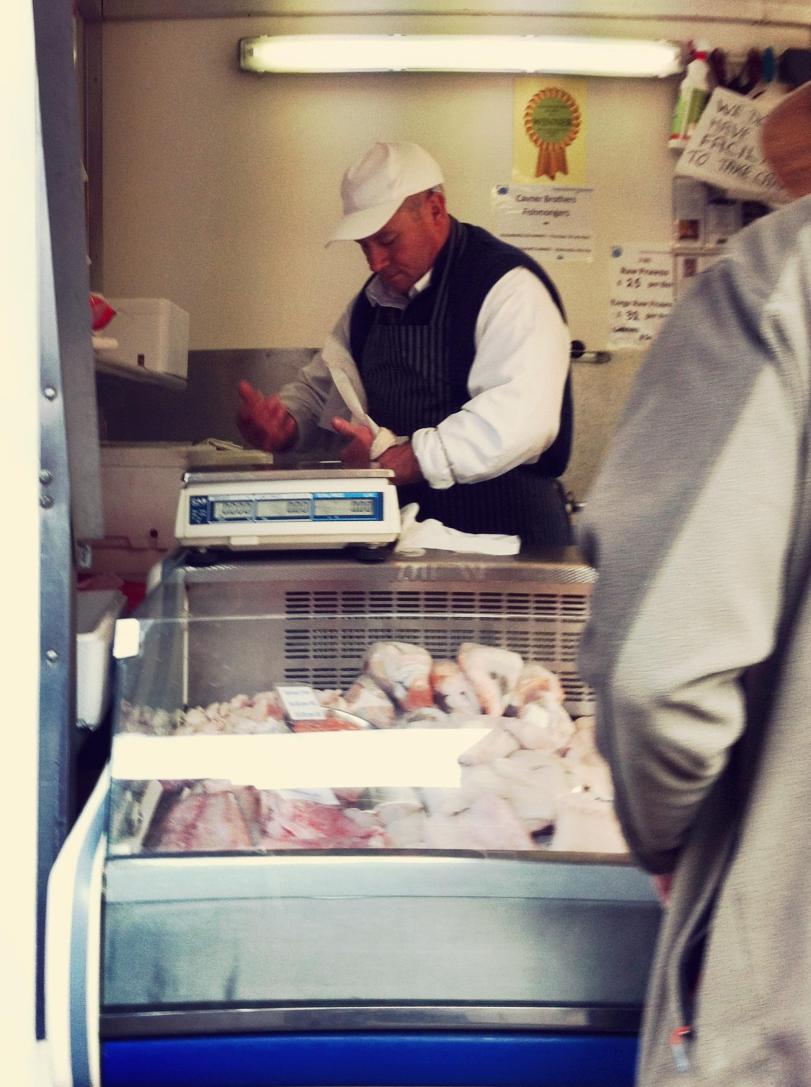 Fishmonger weighing Fish on Loughborough Street Market - May 2017 - Paul Conneally Fish Stall - Loughborough - Paul Conneally May 2017